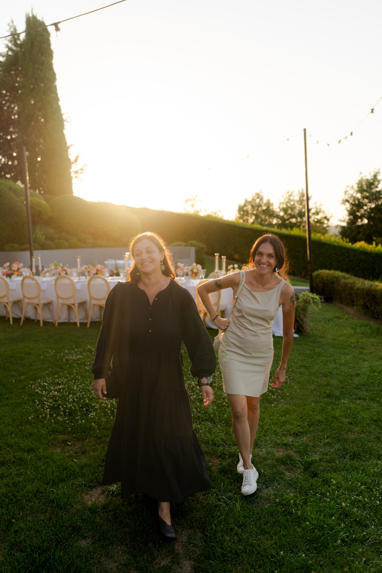 Elisa and Rubina at a wedding reception at Villa Olivo
